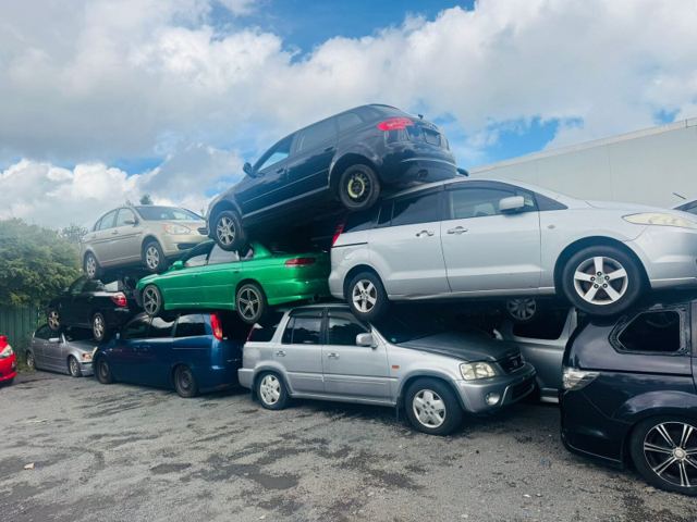 Scrap cars stacked at an Otago recycling yard